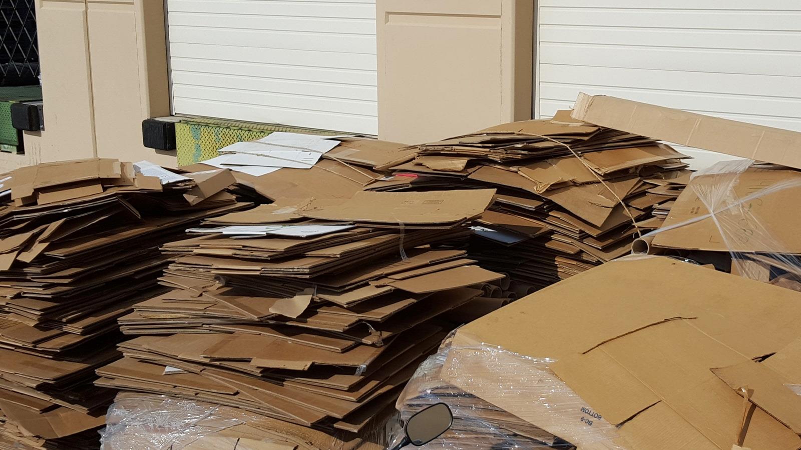 Stacks of cardboard outside of factory