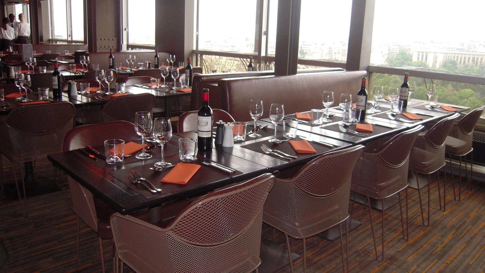 Tables with wine and glasses in the Eiffel Tower restaurant