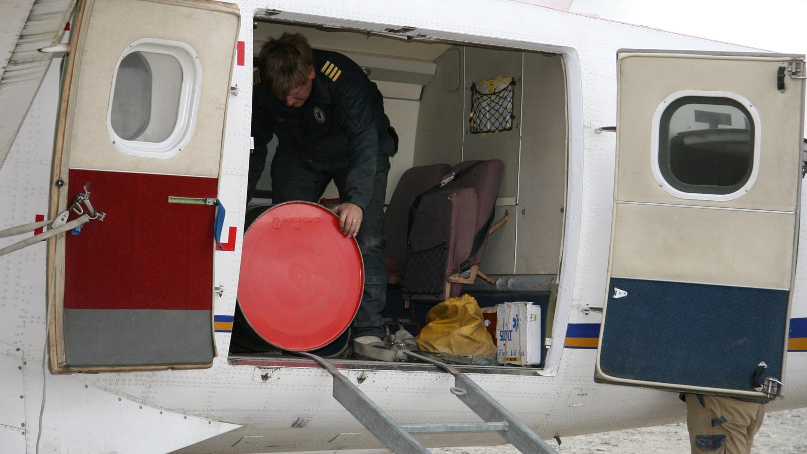 Drum being unloaded from airplane